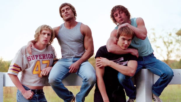 The cast of "The Iron Claw" take a promotional photo on the Von Erich family ranch set.